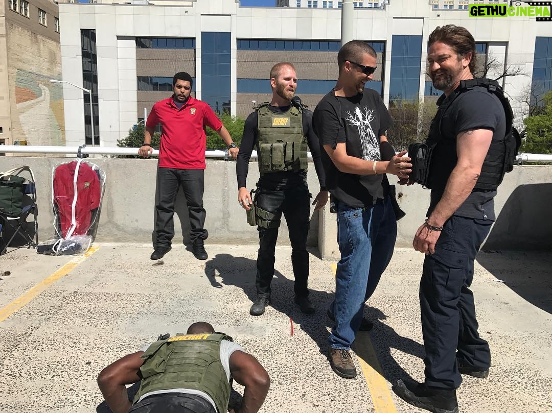 Gerard Butler Instagram - Mo licking ants off the ground. Tough times on the #DenOfThieves set. The movie drops next month.