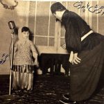 Googoosh Instagram - Throwback to a picture I recently received from Iran. Here next to my father performing as we always did 🎙️ #SaberAtashin ❤️ عکسی که به تازگی از ایران به دستم رسید. روی صحنه در کنار پدر و آموزگارم صابر آتشین 🤍