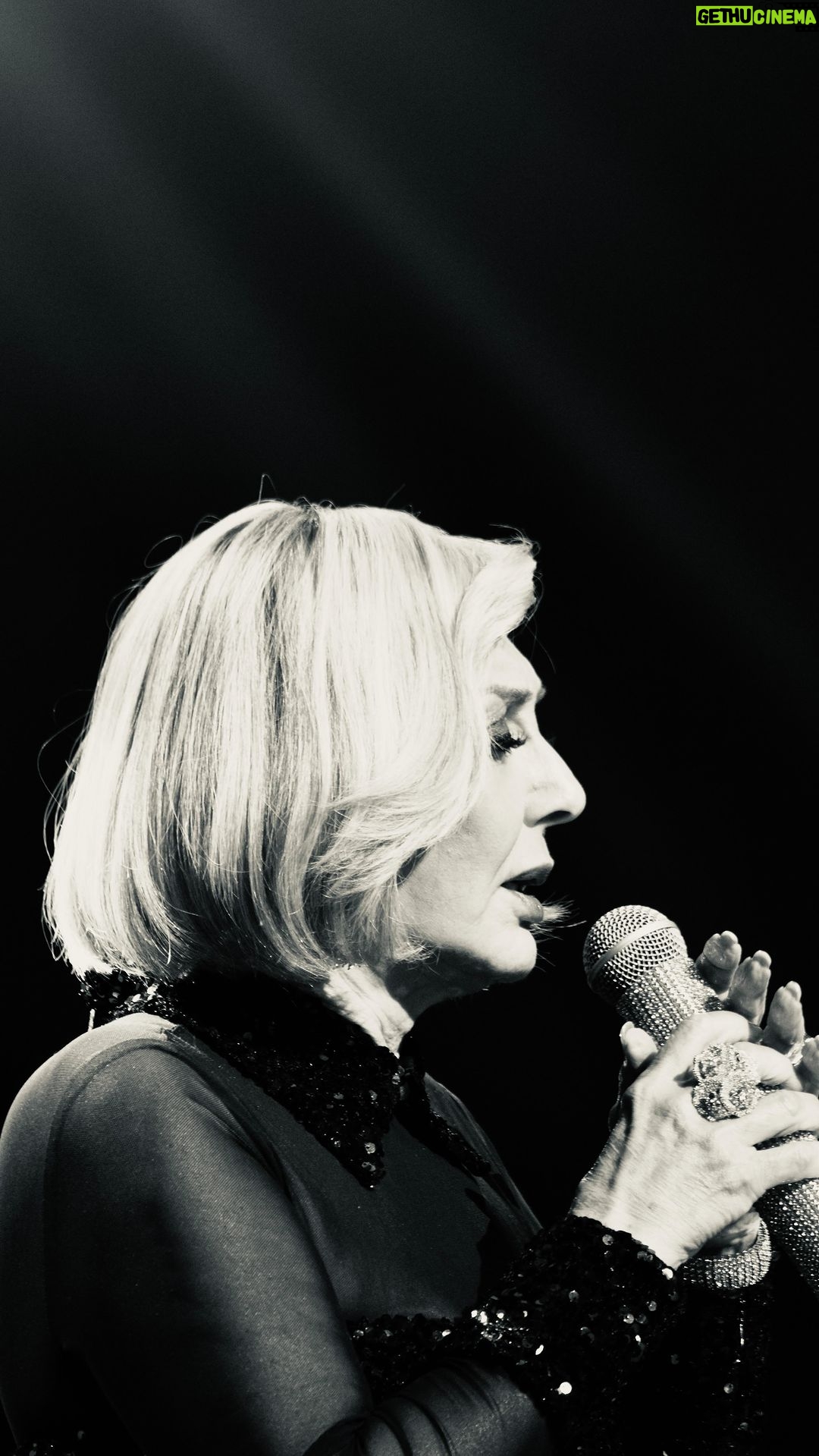 Googoosh Instagram - The national treasure of Iran is no stranger to discrimination and harassment. On the first night of her farewell tour, she spoke up with courage, power and vulnerability against those who hide behind the curtain of social media to spread fear and hatred. Their comments are deeply rooted in ageism, biases, and sexism and do not deserve responses. Googoosh’s astonishing stage presence and stunning voice proved she is, has been and will always be the symbol of female empowerment and the beloved daughter of Iran. #repost @virasb گنجینه ملی ایران، گوگوش، با آزار و اذیت بیگانه نیست. در اولین شب تور خداحافظیاش، او با شجاعت، قدرت و آسیب پذیری در برابر کسانی که پشت پرده رسانه های اجتماعی پنهان شده اند و نفاق و نفرت پراکنی میکنند صحبت کرد. نظرات آنها عمیقاً ریشه در تعصبات و تبعیضات جنسی و سنی دارد و شایسته پاسخ نیست. حضور با شکوه گوگوش بر روی صحنه و صدای حیرت انگیزش یاد آوری بود که او همیشه نماد قدرت و ایستادگی زن ایرانی و شاه ماهی هنر ایران بوده است و خواهد بود.