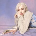 Grimes Instagram – Launching new A.I. Girl group NOV 12! 

(Were super behind on everything and you’ll all see why in a month or so , so I apologize abt delays of music and visuals.  Gna be catching up on the girls visual development and whatnot – but me and @chrislake just needed to get this song out cuz it’s been going so hard at festivals!!!! 

(((((PS i included the un retouched image cuz this is more retouching than i normally do and whilst I look hot haha I do fear for the mental health effects of ye olde photo shoppé 

I may have had some filler mishaps over the years but def didn’t get a nose job haha