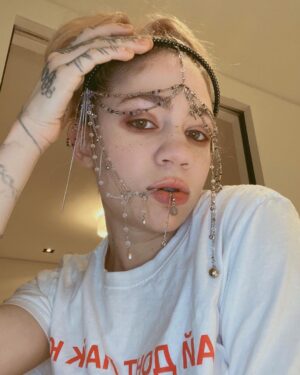 Grimes Instagram - ppl make fun of my big nose and weird face but I think it’s cool to be strange.  Took me a while to figure out how to make makeup look good cuz regular tricks don’t work.  But I’m grateful to be oddly designed