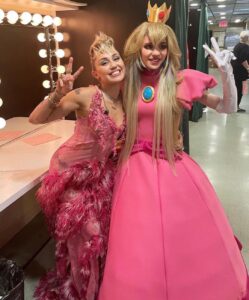 Grimes Instagram - Forgot to post these cuz I somehow caused myself to have a panic attack and went to the hospital yesterday which tbh was quite scary and I suppose it’s a good time to start therapy 😑😑😑. But nonetheless - wowwwww @mileycyrus is good live and so chill! So grateful to the SNL team for being so kind and letting me sneak in as princess peach snd so proud of my beautiful E (which I know will upset the grimes fans so I apologize in advance) but he killed it 🤍