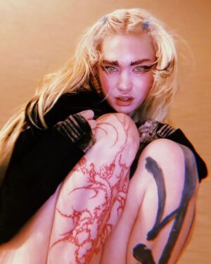 Grimes Instagram - Obligatory "plz listen to new music " post (link in bio)

Altho I do genuinely love and adore this song ngl, @anyma - if I ever get to do a video for it rly feeling some sci fi phantom of the opera thing where I'm the phantom and we're the only two ppl left on a giant spacecraft that's lost contact.  Like toxic horror pseudo Victorian gay space romance. 

Ps so stoked w this tattoo by @caidasindesamparo - got a bunch of amazing pics of it yesterday 🙏🏻 I am marveling at this masterpiece on my leg 🚀🪐🤍