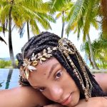 Halle Bailey Instagram - minding my business…wbu? 😇🌴✨