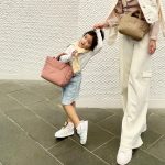 Hanis Zalikha Instagram - When we have matching get-ups, we OOTD! Still can’t believe my girl has left her baby phase behind so I must capture more moments like this 🥹 Anyhoo, this Puffy Mini Tote is the bag of the moment! You will see me a lot with it, I promise — it’s so spacious and so so cool. Sometime Bag @sometime_byasiandesigners just launched them yesterday so grab yours now!