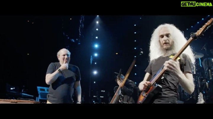 Hans Zimmer Instagram - It's time for another #HansZimmerLive Meet the Band with the amazing @Guthrie.Govan. He’s a brilliant, self-taught guitarist. He plays in his band “The Aristocrats” and is, without a doubt, the greatest improviser alive. On the last @HansZimmerLive 2022 show in Stockholm, my son @_Max.Zimmer captured this mind-bending solo up close. Watch and take notes! Also, 👋 to @PedroEustache 😁