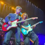 Hans Zimmer Instagram - Since @hanszimmerlive is on a tour break, thought it would be fun to re-introduce you to some of our band members! The amount of musical genius in the Marr family is unmatched. @johnnymarrgram, who I’ve collaborated with for over a decade, started a band called The Smiths back in the 80s and is one of the most iconic guitarists of our generation. Then a few years back, his son @nile_marr joined the #HansZimmerLive band and was the person who convinced me to play “The Lion King” at Coachella. When the two of them play together on stage, it’s unreal! 🎸