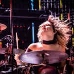 Hans Zimmer Instagram - Percussion is an essential component of the #HansZimmerLive band, and we’re blessed to have two badass drummers at the heart of it. For our next edition of Meet the Band, I’m highlighting @aichadrums and @hollymadgedrums! 🥁 Aicha and Holly might play in unison, but they are very distinct musicians. Aicha hails from Halsted, Essex and joined her first (punk) rock band called Stress at the age of 12. She was playing in clubs she was too young to get into for many years, ended up studying drumming at university in London and graduating with first class honors. Holly got her first drum kit when she was 10 and fell in love with it. She jammed with the teenage fusion funk band Melonious Funk on the rooftops of seaside pubs, and ended up getting a first-class degree in music from Southampton University. Both Holly and Aicha first played with the @hanszimmerlive band in 2014, and we realized our percussion would never be the same if they weren’t part of it!