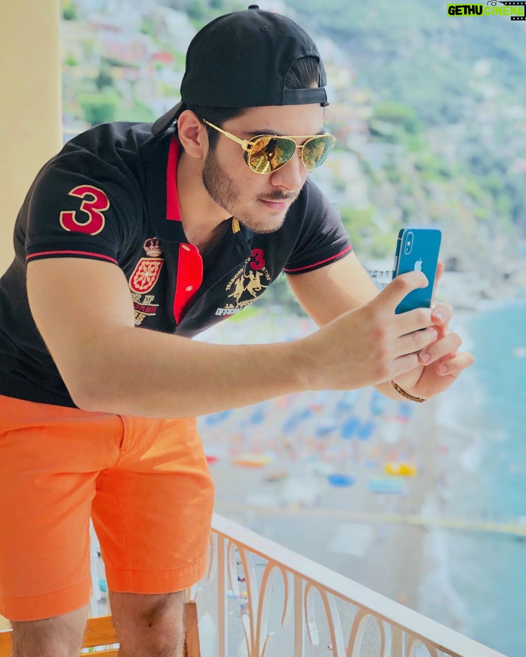 Haroon Kadwani Instagram - What goes behind taking pictures of my siblings vs my picture 🤪 #Positano #Italy #CovoDeiSaraceni #Summer #Summer2019 #OrangeAndBlack #Vacation #Travel #Sunset Positano Centro