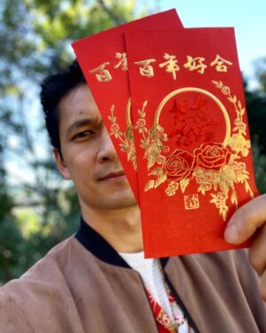 Harry Shum Jr. Instagram - 恭喜发财 Happy Lunar New Year 🧧Loved receiving Hong bao (red envelopes) as a kid and didn’t really know what they said. This one in particular is for weddings (according to my mom) says “100 years of no fighting with your spouse” 😂 I have fond memories of my Popo (grandma) shuffling her way to the bank in the morning to withdrawl cash so she could stuff red envelopes to pass out to her grandkids.  With all the recent attacks/hate crimes on Asian-Americans, I can’t help but think about her walking down the street minding her own business only to be met with being yelled at, spit on, pushed to the ground, beaten or possibly killed just for having an Asian face.  Anti-Asian rhetoric has been around in the U.S. since the early 1850’s many factors are at play and has sneakily continued over generations in various forms. We must get to the root cause of this and confront it now to find a way to protect our community and exterminate this hate that everyone should be appalled by.  I encourage people to not stay silent and speak up as these are the first steps towards finding a better tomorrow. I would be remiss not to mention that we must avoid infighting within the BIPOC (Black-Indigenous-Person Of Color) communities.  We will get nowhere if that becomes the focus.  But a unity of understanding to build on together to get through these dark times. History tends to repeat itself when we don’t learn from the past. If you care about this, then I encourage us to keep the conversation going.  But today, stuff those bellies and wishing you a prosperous new year with an abundance of wealth and health to spill over to your neighbors neighbors. #yearoftheox 🐂 #happylunarnewyear