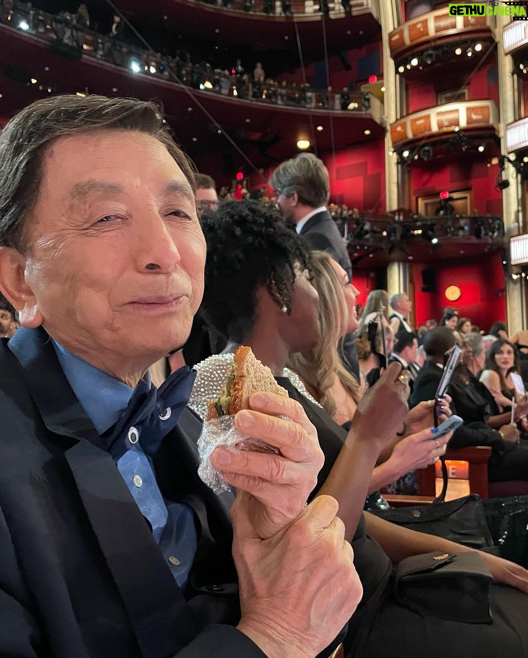 Harry Shum Jr. Instagram - I had the pleasure of hanging with @thejameshong @theacademy who is now my fav grandpa. From his googly eyed tux, to dancing for the crowd, to him whispering in my ear to cradle him and sing him a lullaby during an interview, to having @samuelljackson fanboying over him on how he is going to catch up to his IMDB filmography count, to him eating his self packed sandwich and pre-cut apples during the ceremony, to sipping on a martini (that he went to the bar and ordered himself) and to finally seeing him with an Oscar just made my damn night. He’s a national treasure. 94 and living his best life.