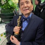 Harry Shum Jr. Instagram - I had the pleasure of hanging with @thejameshong @theacademy who is now my fav grandpa. From his googly eyed tux, to dancing for the crowd, to him whispering in my ear to cradle him and sing him a lullaby during an interview, to having @samuelljackson fanboying over him on how he is going to catch up to his IMDB filmography count, to him eating his self packed sandwich and pre-cut apples during the ceremony, to sipping on a martini (that he went to the bar and ordered himself) and to finally seeing him with an Oscar just made my damn night. He’s a national treasure. 94 and living his best life.
