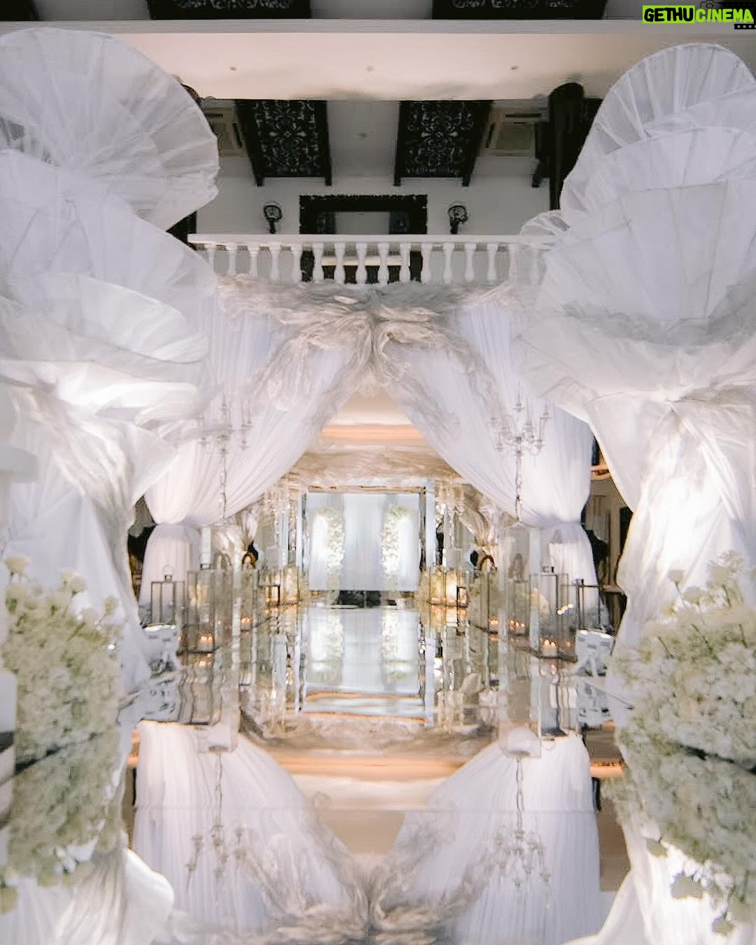 Heart Evangelista Instagram - Imagine being surrounded by countless soft glowing lights, immaculate white flowers, and installations that transport anyone into a world immersed in romance โ styling that takes love to the next level. The wedding of Heart and Sen. Chiz years ago was already a moment, a grand chapter of their love story. Now, they have forged a new beginning under the glow of a million lights, as steady as an undulating fabric that dances with the air, symbolizing a love that is unquestionably resilient through the years. From a world full of chaos and changes comes a love that stays and grows. ๐ธ @michellecentillas @forevermineweddingfilms The Royal Balesin Villa