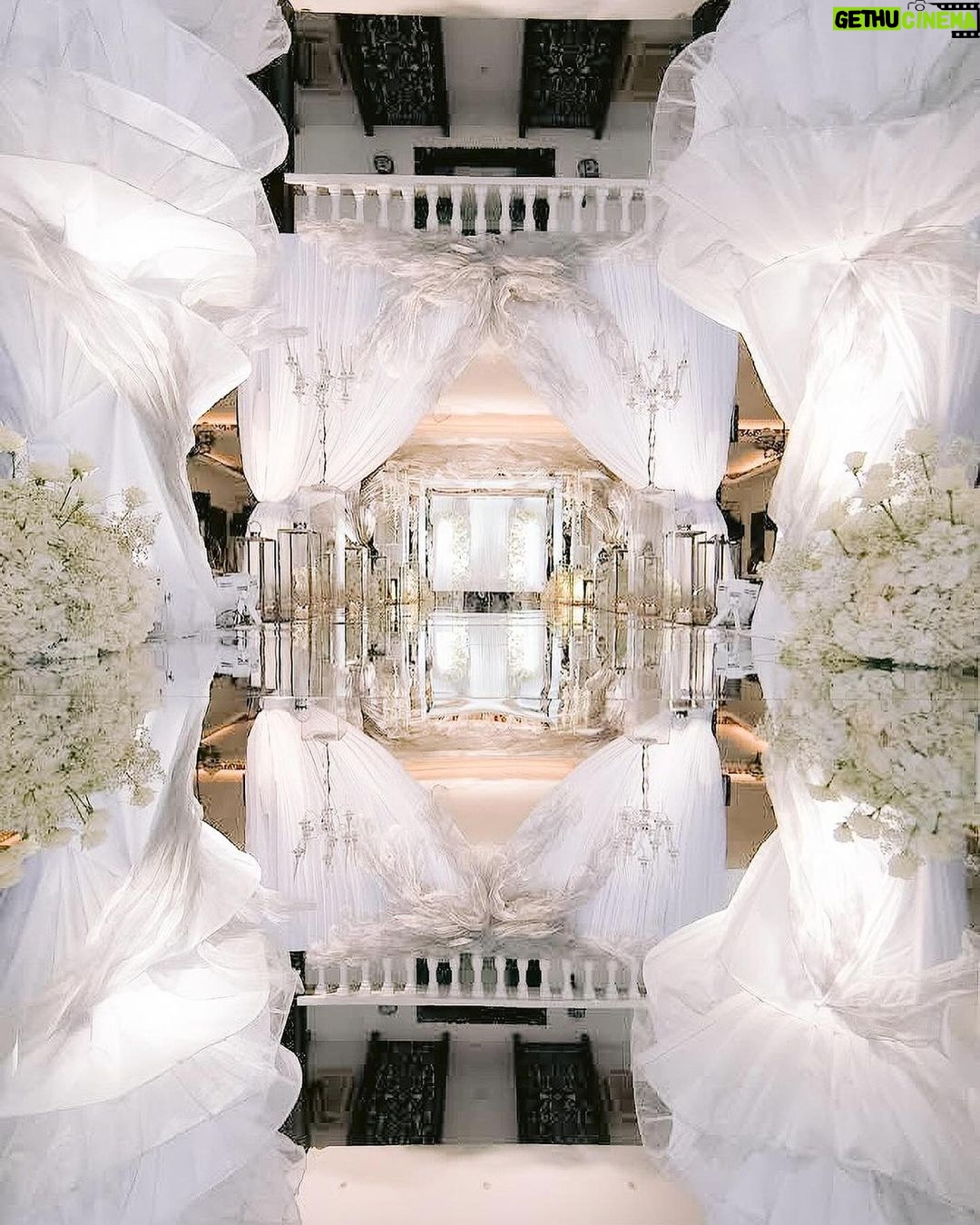 Heart Evangelista Instagram - Imagine being surrounded by countless soft glowing lights, immaculate white flowers, and installations that transport anyone into a world immersed in romance โ styling that takes love to the next level. The wedding of Heart and Sen. Chiz years ago was already a moment, a grand chapter of their love story. Now, they have forged a new beginning under the glow of a million lights, as steady as an undulating fabric that dances with the air, symbolizing a love that is unquestionably resilient through the years. From a world full of chaos and changes comes a love that stays and grows. ๐ธ @michellecentillas @forevermineweddingfilms The Royal Balesin Villa