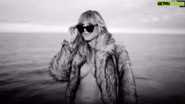 Heidi Klum Instagram - My new song SUNGLASSES AT NIGHT produced by the one and only @tiesto is out today 😎 Keep dreaming kids and don’t let anyone tell you what you can and cannot do. @rankinarchive 😘 🎥: @sabinestephandop #SunglassesAtNight