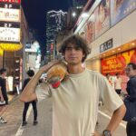 Iñaki Godoy Instagram - Just hanging out in Japan with my new best friend 🇯🇵🦆 What should we name him ??? Also, make sure to check out my website for more cool stuff !!!