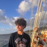 Iñaki Godoy Instagram - Day 15: We just got to Grenada after a chaotic 3 day passage. I’ve never done something so extreme in my life, being part of this crew is insane. There’s been lots of rain, waves, cold wind. But also rainbows, stars, and beautiful sunsets. Learning how to sail is hard, I’m still trying to figure out the name of every line. However, this adventure is giving me so many amazing memories that I will never forget. Can’t wait to tell you more in the future !!!