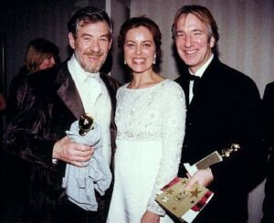 Ian McKellen Instagram - ALAN RICKMAN (1946-2016)
There is so much that is matchless to remember about Alan Rickman. His career was at the highest level, as actor on stage and screen and as director ditto. His last bequest of his film "A Little Chaos" and his indelible performance as Louis 14th, should now reach the wider audience they deserve.
Beyond a career which the world is indebted to, he was a constant agent for helping others. Whether to institutions like RADA or to individuals and certainly to me, his advice was always spot-on. He put liberal philanthropy at the heart of his life. He and Rima Horton (50 years together) were always top of my dream-list dinner guests. Alan would by turns be hilarious and indignant and gossipy and generous. All this delivered sotto, in that convoluted voice, as distinctive as Edith Evans, John Gielgud, Paul Scofield, Alec Guinness, Alastair Sim or Bowie, company beyond compare.
When he played Rasputin, I was the Tzar Nicholas. Filming had started before I arrived in St Petersburg. Precisely as I walked into the hotel-room, the phone rang. Alan, to say welcome, hope the flight was tolerable and would I like to join him and Greta Scacchi and others in the restaurant in 30 minutes? Alan, the concerned leading man. On that film, he discovered that the local Russian crew was getting an even worse lunch than the rest of us. So he successfully protested. On my first day before the camera, he didn't like the patronising, bullying tone of a note which the director gave me. Alan, seeing I was a little crestfallen, delivered a quiet, concise resume of my career and loudly demanded that the director up his game.
Behind his starry insouciance and careless elegance, behind that mournful face, which was just as beautiful when wracked with mirth, there was a super-active spirit, questing and achieving, a super-hero, unassuming but deadly effective.
I so wish he'd played King Lear and a few other classical challenges but that's to be greedy. He leaves a multitude of fans and friends, grateful and bereft.
-- Ian McKellen, London, 14 January 2016
Photo: Ian McKellen, Greta Scacchi and Alan Rickman at the Golden Globe Awards, 1997