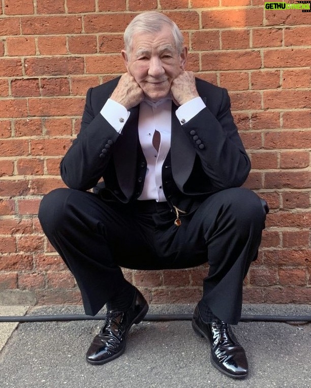 Ian McKellen - 81.9K Likes - Wimbledon has the Centre Court and also the Theatre, where I first appeared in the pre-West End run of "A Scent of Flowers." I shared a dressing room with the late Peter Howell. There we were by the stage door, enjoying the late summer sun after a Wednesday matinée in 1964. https://mckellen.com/stage/00028b.htm Yesterday I was back on location at Wimbledon Theatre, by the same distinctive brick wall, after my first day filming Patrick Marber’s screenplay "The Critic."