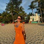 Irene Kim Instagram - good times & tan lines🍊🌞🌺