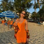 Irene Kim Instagram - good times & tan lines🍊🌞🌺