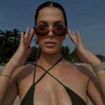 Iris Mittenaere Instagram – Mes lunettes pour aller vite. 
3rd one is the real one. 
@prada 🕶️

Collaboration commerciale Assinie, Côte D’ivoire