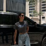 Iris Mittenaere Instagram - My cute outfit 💕. So sorry I couldn’t choose 🫣 les cheveux vous aimez ? C’est nouveau ahah j’aime bien Je suis la personne la plus indécise du monde 😌😅 Business Bay