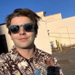 Jack Griffo Instagram - This is me in my favorite shirt catching some tremendous light beams before shooting with the tremendous Ryan all with sweat resting above my lip. Style is a such a major key for me. The opportunity to express yourself and turn conversation your way or break social norms for some people before saying anything at all. It is so powerful. Don’t ever drink and drive. Don’t ever text and drive. It’s most definitely the most uncool, and never worth your or someone else’s life. Freedoms come at their cost.