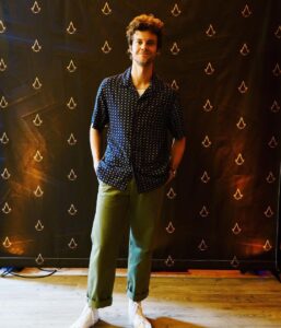 Jack Quaid Instagram - #ad Oh hello! I got to live my childhood dreams and play Assassin’s Creed Mirage before launch at @Ubisoft San Francisco this week. It’s unreal, y'all are going to love it. I can’t wait to see how the rest of the game unfolds. Make sure to check it out on October 5th! #AssassinsCreed 👍🏻