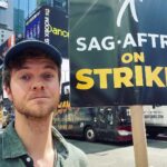 Jack Quaid Instagram - Sweatin’, Stinkin’, & Strikin’ in Times Square. The naked cowboy even showed up to support. #sagaftra #sagstrike #sagaftrastrong #wgastrong