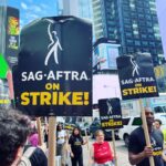 Jack Quaid Instagram - Sweatin’, Stinkin’, & Strikin’ in Times Square. The naked cowboy even showed up to support. #sagaftra #sagstrike #sagaftrastrong #wgastrong