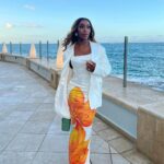 Jackie Aina Instagram - do it right the first time 🐚 thank you @hanifaofficial for this stunning look via @parischea Condado Vanderbilt Hotel