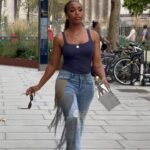 Jackie Aina Instagram – when the denim moves with your bawdy 🤌🏾 @hellessy