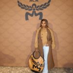 Jackie Aina Instagram - Essential accessories at @mcmworldwide Can confirm the new Crush fragrance smells GORG! #milanfashionweek #mcmworldwide #mcm #mcmfragrance