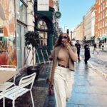 Jackie Aina Instagram - don’t call me materialistic and then not bring the materials FOH! 😂😂😂😂😂😂😂😂😂😂 top: Wolford Pants: cos Cardigan: dissh Shoe+bag: Gucci Glasses: celine Belt: Louis Vuitton Oxford Circus, Vapiano