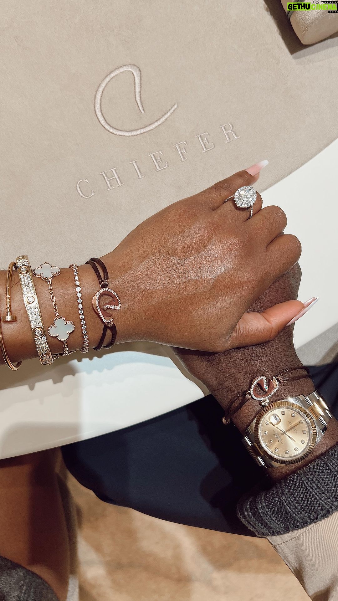 Jackie Aina Instagram - In london, lets get dressed 🥰 Cardigan + skirt: Helsa Loafer: Prada Coat: Rhune Bag: Hermes Earrings + brooch: Chanel Bracelets: Van Cleef, Cartier, Chiefer #londonfashion #getdressedwithme #helsa #helsastudio #pradaloafers #rhune