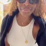Jackie Aina Instagram - life is great 🥂 headband: amazon tank top: amazon coat: zara pants: Simkhai loafers: Chanel handbag: Bottega Veneta belt: Fendi Beau-Rivage Geneva