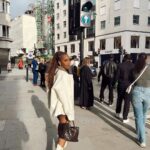 Jackie Aina Instagram - where we going? 💭 🗺️ (swipe to the end to find out) coat: #dior cardigan: #dissh shorts: #jacquemus boots: Dior handbag: #bottega earrings: Dior #londonstreetstyle #londonfashion Hermes New Bond Street