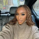 Jackie Aina Instagram - a series of fortunate events 🤗 cardigan + dress Dissh shoes: Gucci handbag: Bottega The Landmark London