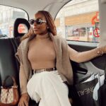Jackie Aina Instagram - don’t call me materialistic and then not bring the materials FOH! 😂😂😂😂😂😂😂😂😂😂 top: Wolford Pants: cos Cardigan: dissh Shoe+bag: Gucci Glasses: celine Belt: Louis Vuitton Oxford Circus, Vapiano