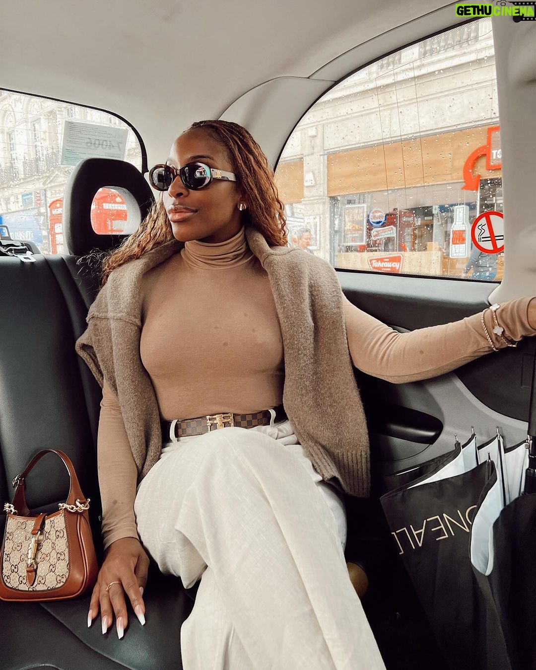 Jackie Aina Instagram - donβt call me materialistic and then not bring the materials FOH! ππππππππππ top: Wolford Pants: cos Cardigan: dissh Shoe+bag: Gucci Glasses: celine Belt: Louis Vuitton Oxford Circus, Vapiano