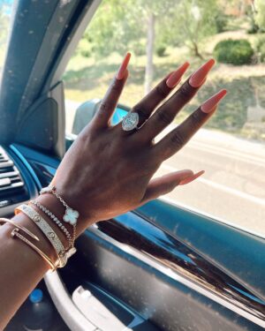 Jackie Aina Instagram - passenger princess behavior 🚙 @prada #pradagalleria #carseflie
