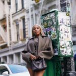 Jackie Aina Instagram - I’m not like other girls, I’m way worse 😘 coat + shorts @jacquemus via @farfetch boots @ralphlauren bag #bottegaveneta photos @nishajohny hair @kendrasboutique