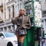 Jackie Aina Instagram - I’m not like other girls, I’m way worse 😘 coat + shorts @jacquemus via @farfetch boots @ralphlauren bag #bottegaveneta photos @nishajohny hair @kendrasboutique