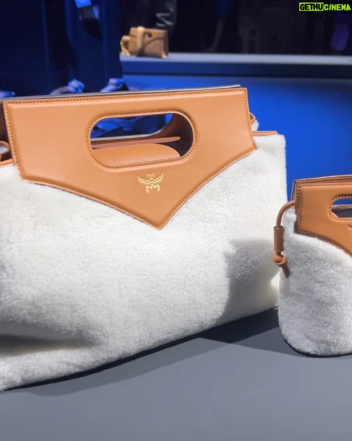 Jackie Aina Instagram - Essential accessories at @mcmworldwide Can confirm the new Crush fragrance smells GORG! #milanfashionweek #mcmworldwide #mcm #mcmfragrance