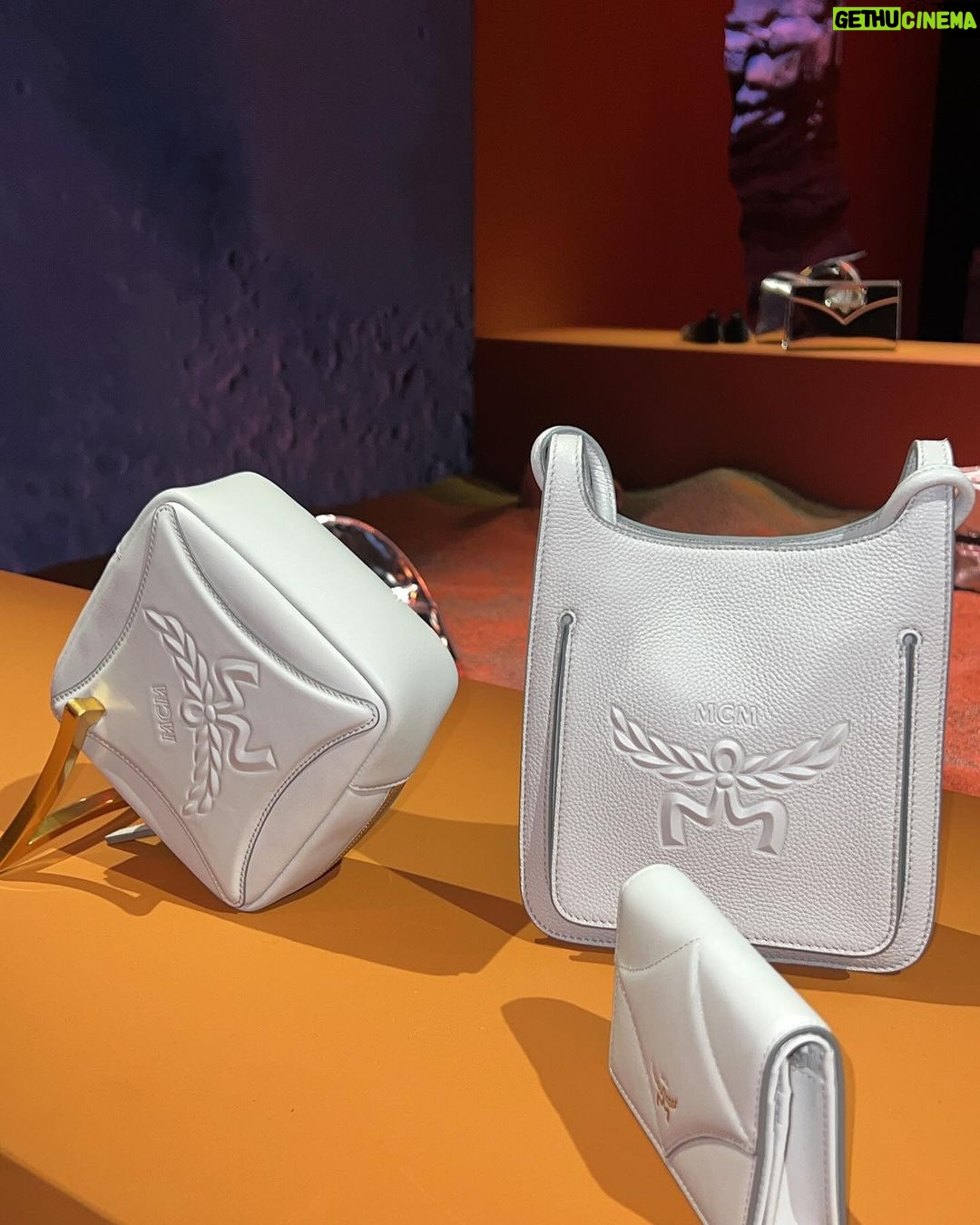 Jackie Aina Instagram - Essential accessories at @mcmworldwide Can confirm the new Crush fragrance smells GORG! #milanfashionweek #mcmworldwide #mcm #mcmfragrance