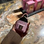 Jackie Aina Instagram - Essential accessories at @mcmworldwide Can confirm the new Crush fragrance smells GORG! #milanfashionweek #mcmworldwide #mcm #mcmfragrance