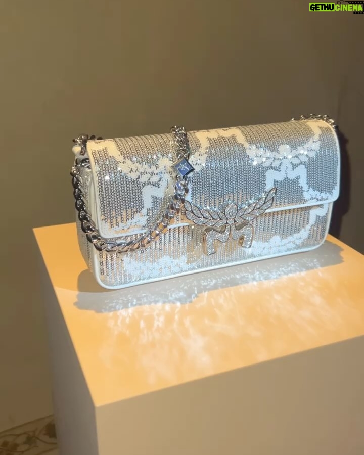 Jackie Aina Instagram - Essential accessories at @mcmworldwide Can confirm the new Crush fragrance smells GORG! #milanfashionweek #mcmworldwide #mcm #mcmfragrance