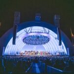 Jacob Collier Instagram - HOLLYWOOD BOWL!!!! Mind is still profoundly boggled. 12,000 strong, in a city far from home - my biggest headline show ever. We poured our hearts and souls into this one. To hear the miraculous @laphil and conductor Thomas Wilkins breathe such life into all my orchestrations, with only one 3-hour rehearsal on the day to put it all together, was incredible beyond words. Thank you to the otherworldly @brandicarlile , the luminescent @maro.musica , my wonderful mother @suziecollier and my heroes @take6official for joining the fray in such glorious fashion. Thank you to my UNREAL band, @mullarkeybass @christianeuman @erinbentlage @emilyelbert @mofro11 - and my UNREAL crew, for pulling off this show with so much heart, soul and brilliance. And thank you to all who came along. I’ll never forget it, as long as I live. If you were there, you already know….. something is coming next week. Stay tuned. Hollywood Bowl