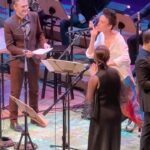 Jacob Collier Instagram – It’s moments like these that make my heart soar the highest.

@christhile @madicunningham @nyphilharmonic – I am forever grateful. My heart is reeling from our wildly luminescent night of music making on Tuesday night. To all who came out to frolic alongside – we couldn’t have done it without you.

Chris, Madi – you are two unbelievably inspiring humans and two absolute masters of your craft… I want to be a sponge around you forever!! Here’s to many more magical musical moments (quiet and loud) :) Lincoln Center